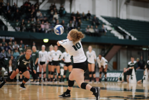 MSU defensive specialist Lauryn Gibbs tries corralling the ball during a game/ Photo Credit: MSU Athletic Communications




