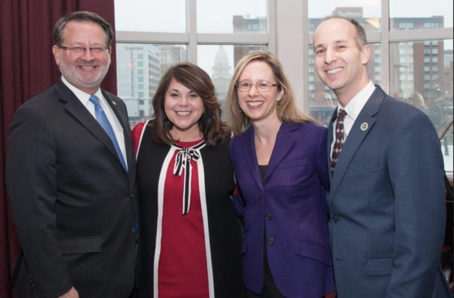 Lansing+mayor+Andy+Schor+%28far+right%29+pictured+with+Michigan+Senator+Gary+Peters+%28far+left%29%2F+Photo+courtesy+of+Andy+Schors+campaign+office