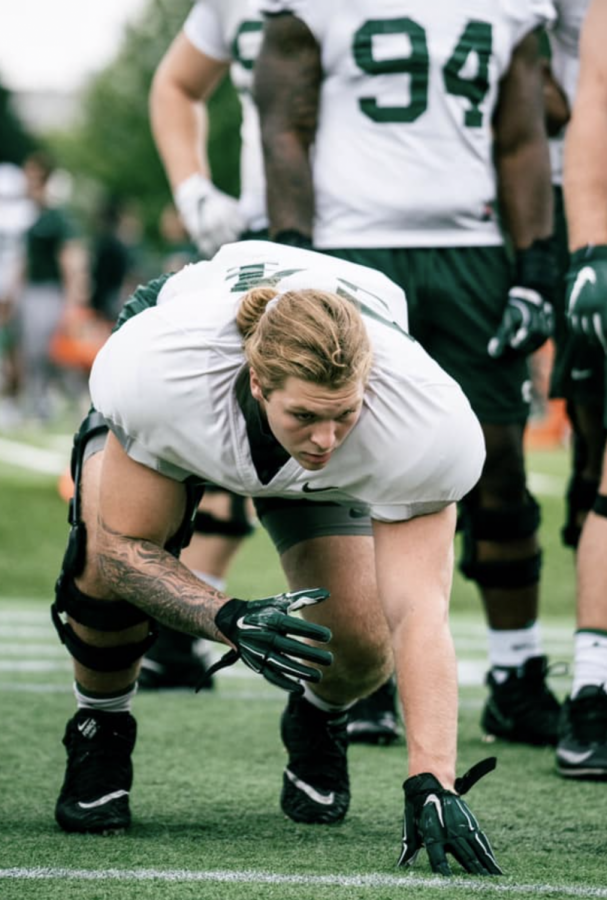 MSU defensive tackle Kyle King practices his stance during fall practice/ Photo Credit: MSU Athletic Communications 