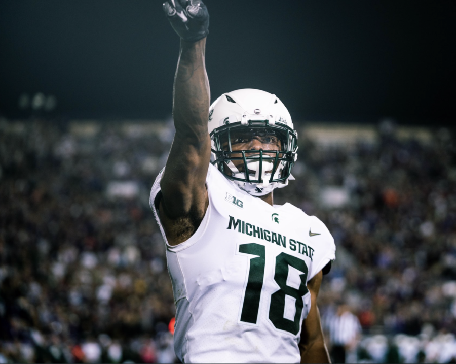MSU cornerback Kalon Gervin points in the Spartans 38-21 road win over Northwestern on Sept. 3/ Photo Credit: MSU Athletic Communications 