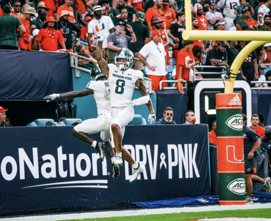 MSU+wide+receiver+Jalen+Nailor+celebrates+with+Jayden+Reed+after+scoring+a+late+touchdown+in+the+Spartans+38-17+win+over+No.+24+Miami+on+Sept.+18%2C+2021%2F+Photo+Credit%3A+MSU+Athletic+Communications+