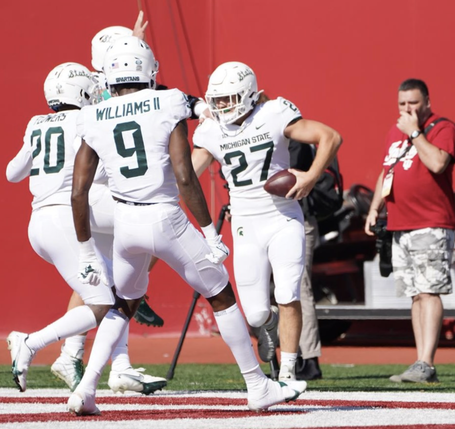 MSU+linebacker+Cal+Haladay+%2827%29+celebrates+after+making+a+pick-six+interception+in+the+Spartans+20-15+win+over+Indiana+on+Oct.+16%2C+2021%2F+Photo+Credit%3A+MSU+Athletic+Communications+