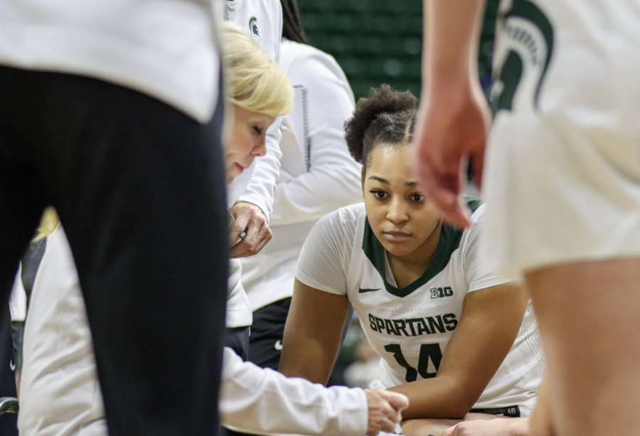 MSU forward Taiyier Parks looks on as Suzy Merchant draws up a play during the Spartans 73-64 loss to No. 24 Notre Dame on Dec. 2, 2021/ Photo Credit: Sarah Smith/WDBM