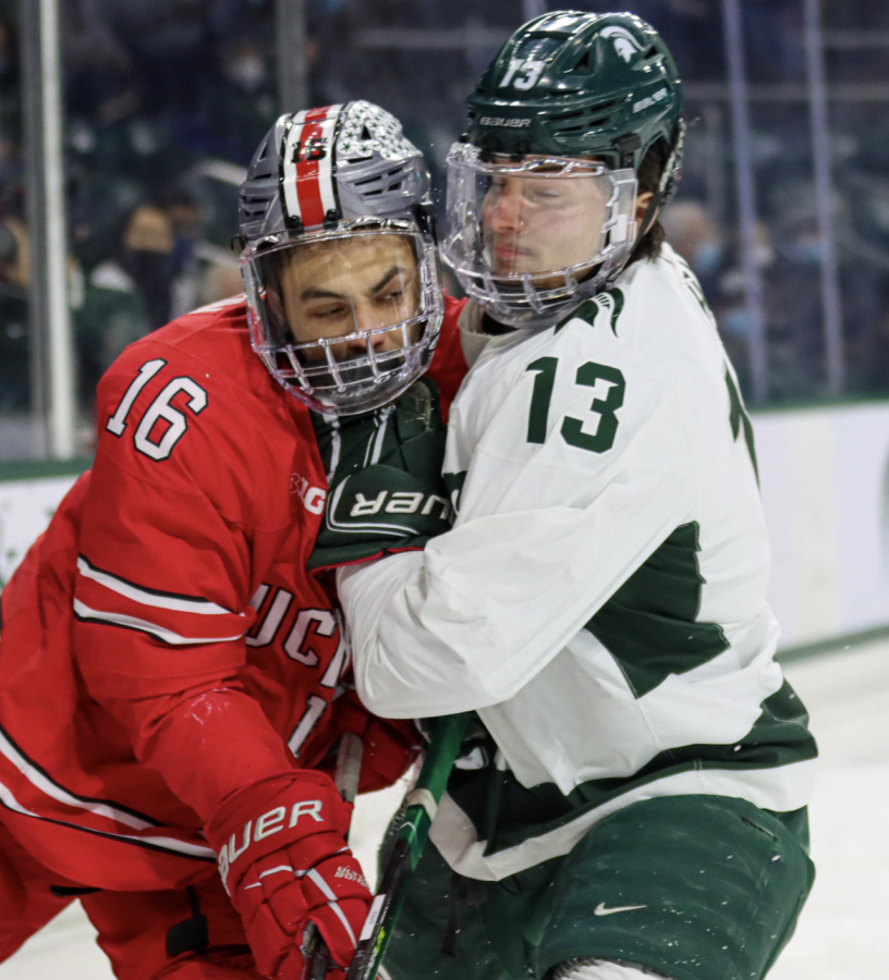MSU+forward+Kristoff+Papp+collides+with+Buckeye+forward+Quinn+Preston+during+the+Spartans+4-1+loss+to+Ohio+State+on+Jan.+21%2C+2022%2F+Photo+Credit%3A+Sarah+Smith%2FWDBM