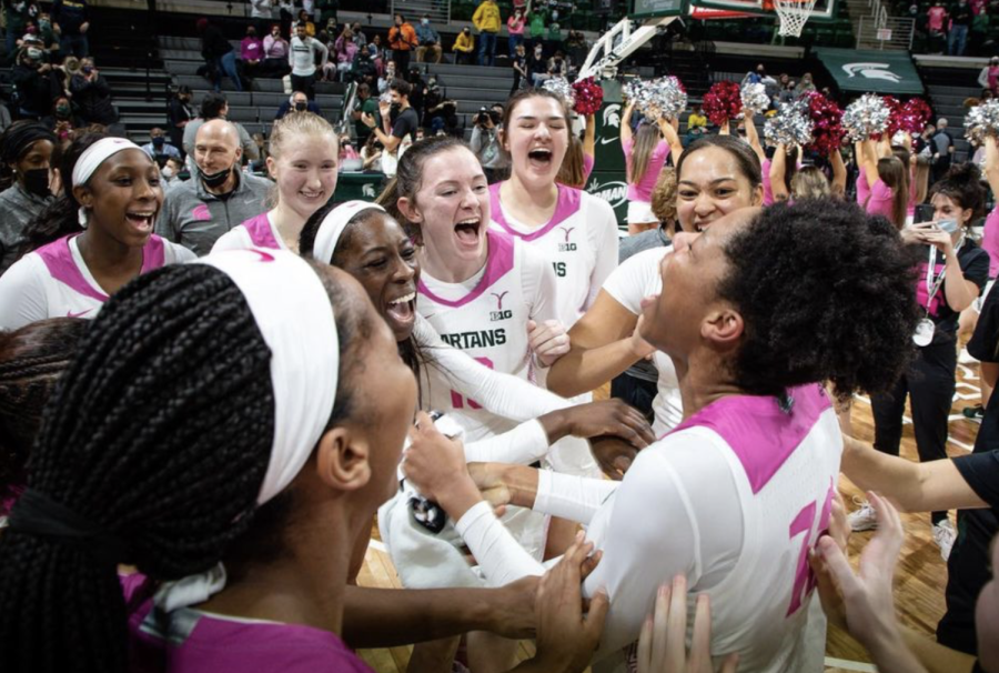 MSU forward Isaline Alexander celebrates with her teammates during the Spartans 63-57 over No. 4 Michigan on Feb. 10, 2022/ Photo Credit: MSU Athletic Communications 