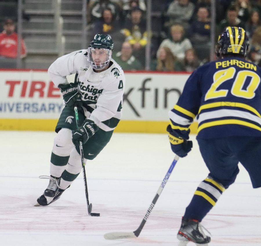 MSU defenseman Nash Nienhius skates with the puck during the Spartans 7-3 loss to Michigan on Feb. 12, 2022/ Photo Credit: Sarah Smith/MSU Athletic Communications 