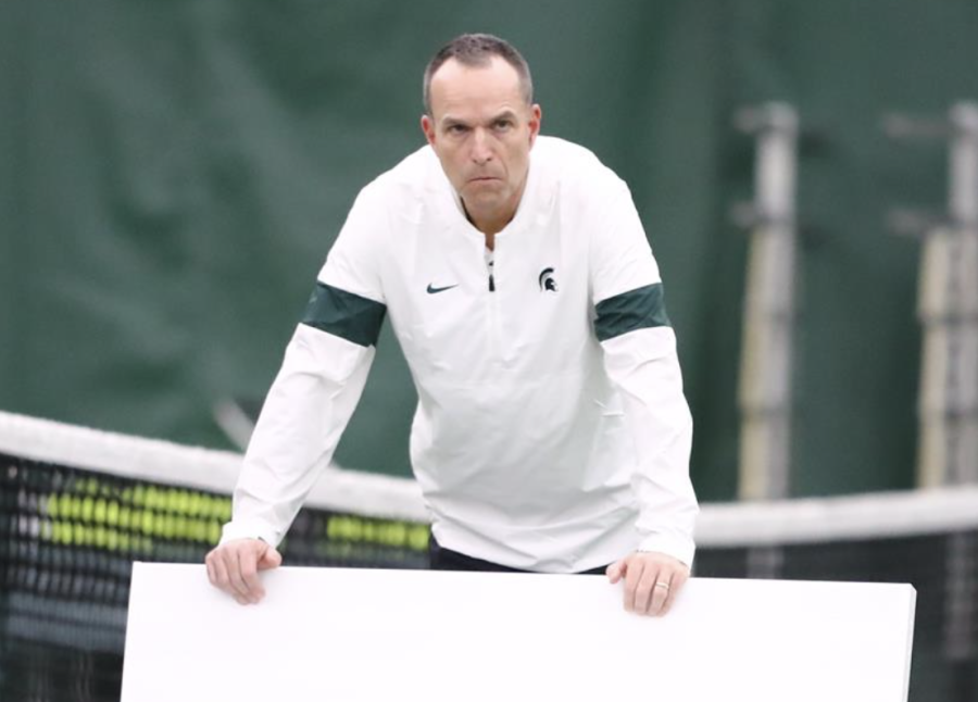 Michigan State mens tennis coach Gene Orlando observes his team during a practice session/Photo Credit: MSU Athletic Communications 