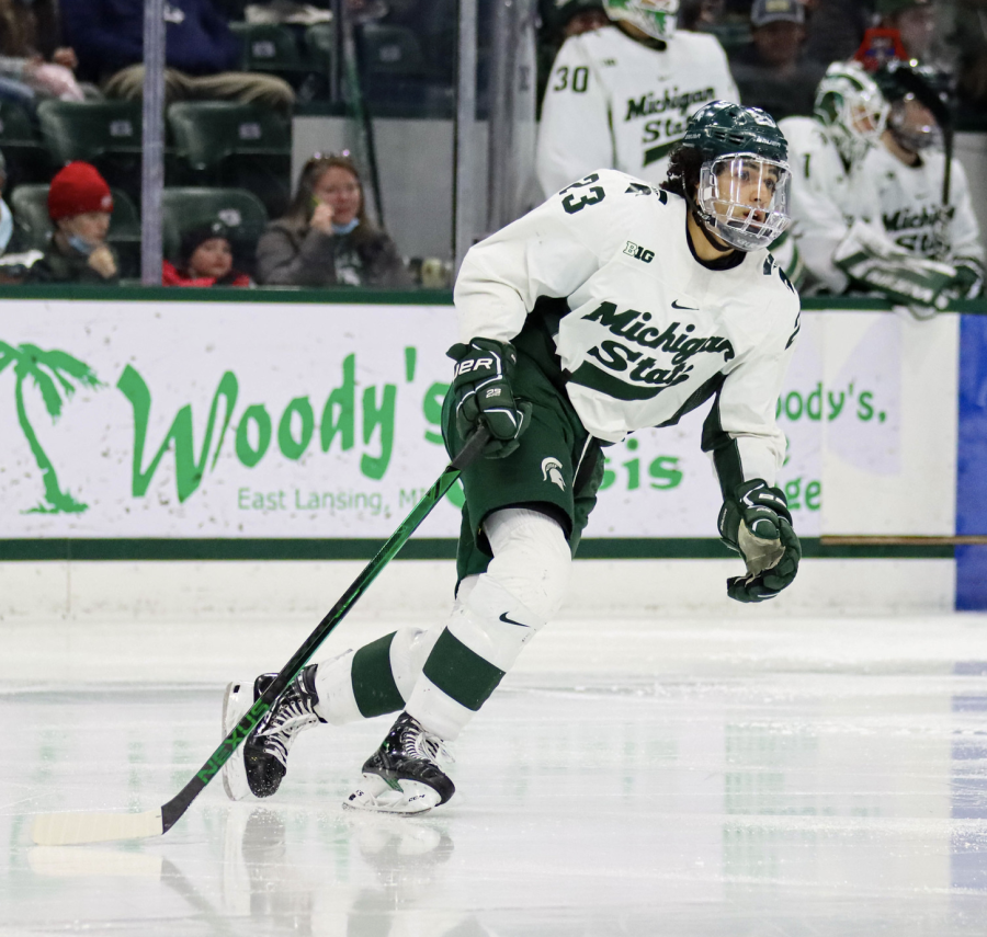 MSU+forward+Jagger+Joshua+chases+down+the+puck+during+the+Spartans+5-3+loss+to+Penn+State+on+Feb.+25%2C+2022%2F+Photo+Credit%3A+Sarah+Smith%2FWDBM