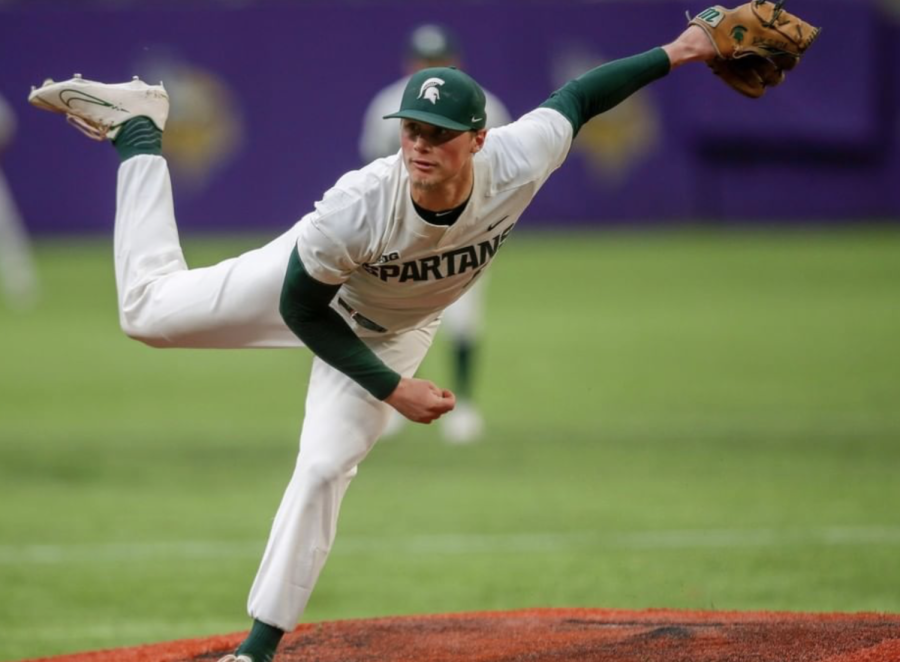 MSU pitcher Wyatt Rush delivers a pitch during the Spartans 11-2 win over Kansas on March 4, 2022/ Photo Credit: MSU Athletic Communications 