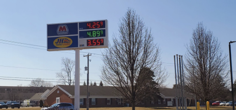 Picture from Hagadorn road and Lake Lansing road depicting the gas prices at Marathon gas station of regular = $4.259, diesel = $4.899 and E85 = $3.559. Background is clear blue sunny sky.