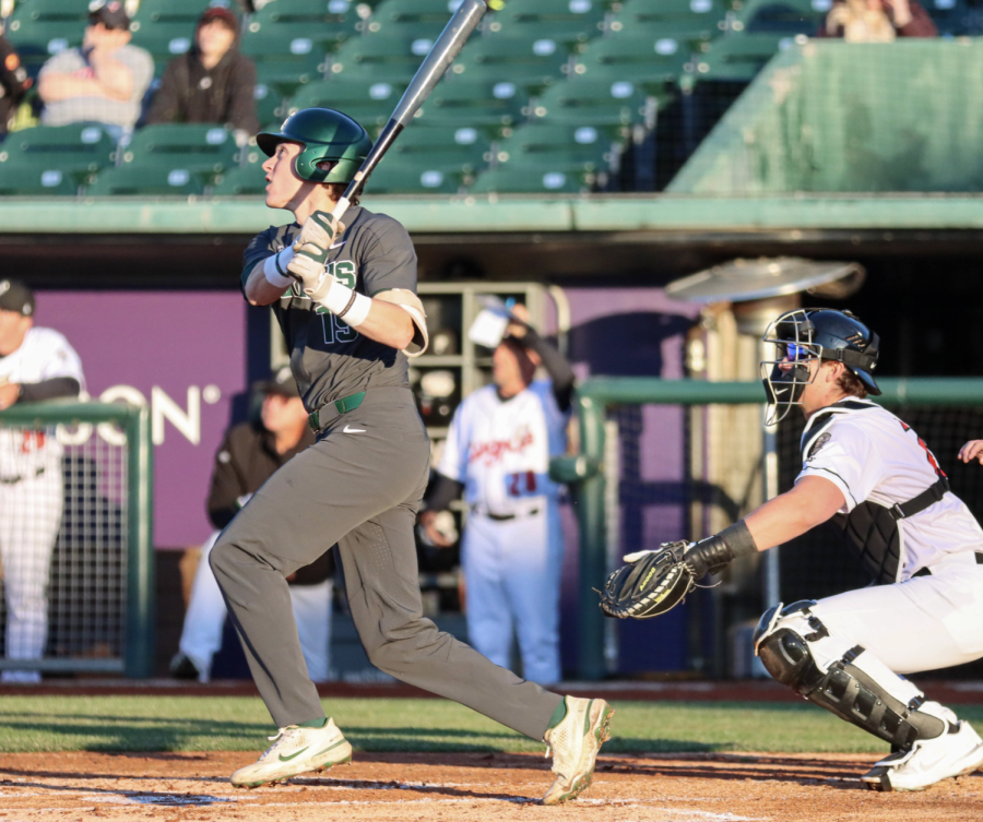 MSU catcher Bryan Broecker swings at a pitch during the Spartans 3-2 loss to the Lansing Lugnuts on April 6, 2022/ Photo Credit: Sarah Smith/WDBM