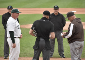 MSU head coach Jake Boss exchanges lineup cards with an umpire before the Spartans take on Western Michigan on April 13, 2022/ Photo Credit: MSU Athletic Communications