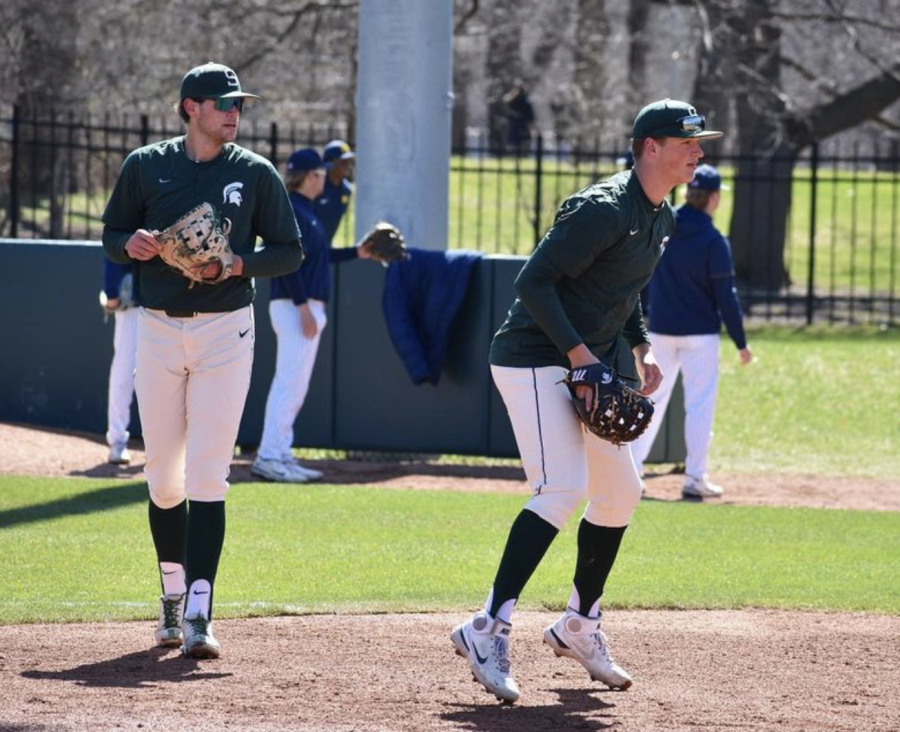 MSU first basemen Sam Busch and Brock Vradenburg take fielding practice before the Spartans take on Michigan on April 17, 2022/ Photo Credit: MSU Athletic Communications