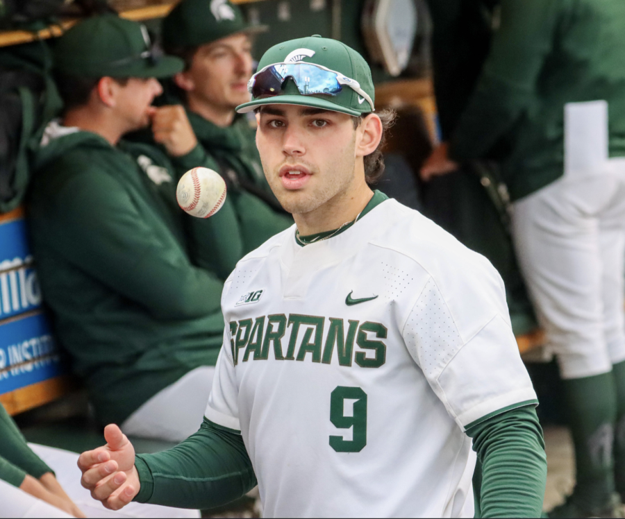 MSU infielder Jacob Anderson stands in the dugout during the Spartans' 6-2 win over Notre Dame on April 26, 2022