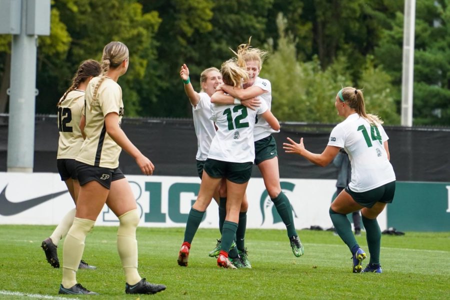 The+Michigan+State+Spartans+celebrate+after+a+goal+was+scored+in+their+3-1+victory+over+Purdue+on+September+25%2C+2022.+Photo+Credit%3A+Ethan+Hunter%2FWDBM