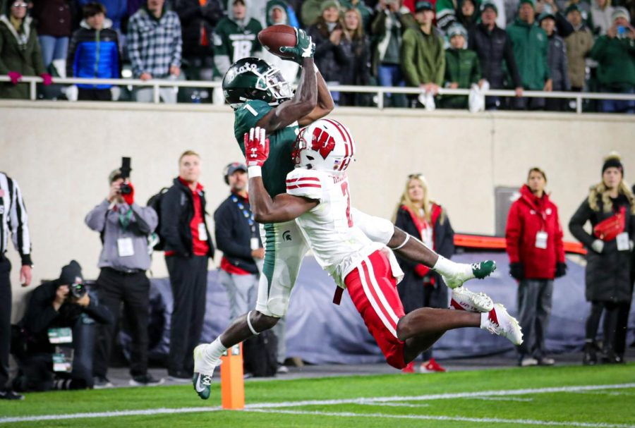 Jayden Reed catches game winning pass in double-overtime against Wisconsin on Oct. 15, 2022 / Photo credit: Sarah Smith