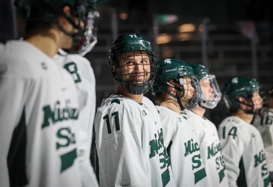 Jeremy+Davidson+smiles+during+the+pregame+prior+to+a+game+against+Umass-Lowell+on+Oct.+13%2C+2022.%2F+Photo+credit%3A+Sarah+Smith