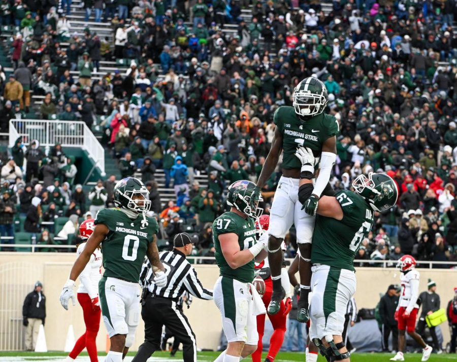 Jayden+Reed+celebrates+a+touchdown+in+win+over+Rutgers+on+Nov.+12%2C+2022%2F+Photo+credit%3A+Jack+Moreland