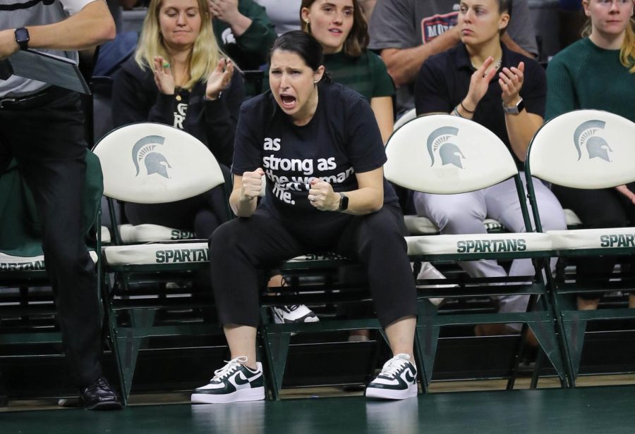 Head Coach Leah Johnson cheers from the bench during Michigan States match against Ohio State on November 5, 2022. Photo Credit: Sarah Smith/WDBM