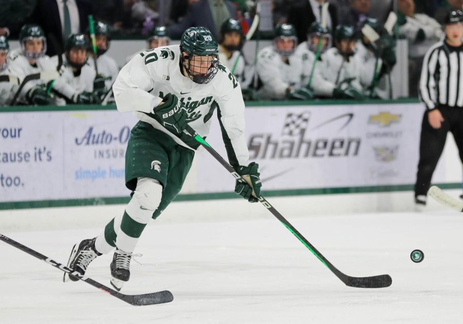 Daniel Russell with the puck during Michigan States loss to Minnesota on December 3, 2022. Photo Credit: Sarah Smith/WDBM