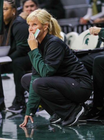 Head Coach Suzy Merchant watches her team during Michigan States game against Purdue on December 5, 2022. Photo Credit: Sarah Smith/WDBM
