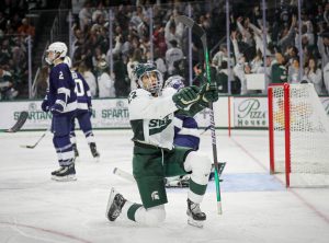 Jagger Joshua celebrates after his third goal during Michigan States tie with No. 5 Penn State on January 14, 2023. Photo Credit: Sarah Smith/WDBM