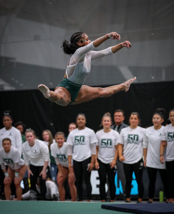 Nikki Smith performs her floor routine during Michigan States 197.200-196.975 victory over No. 3 Michigan on January 22, 2023. Photo Credit: Sarah Smith/WDBM