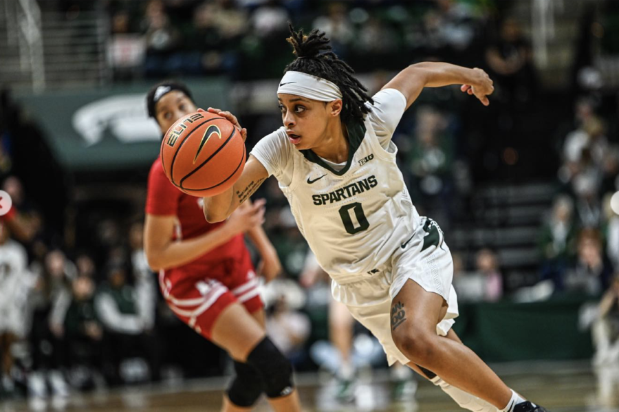 DeeDee Hagemann dribbles into the lane during Michigan States 85-63 victory over Rutgers on January 22, 2023. Photo Credit: Jack Moreland/WDBM