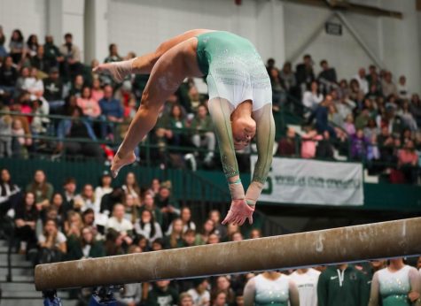 Sage Kellerman flips on the beam during Michigan States 197.450-195.475 victory over Penn State on February 4, 2023. Photo Credit: Sarah Smith/WDBM