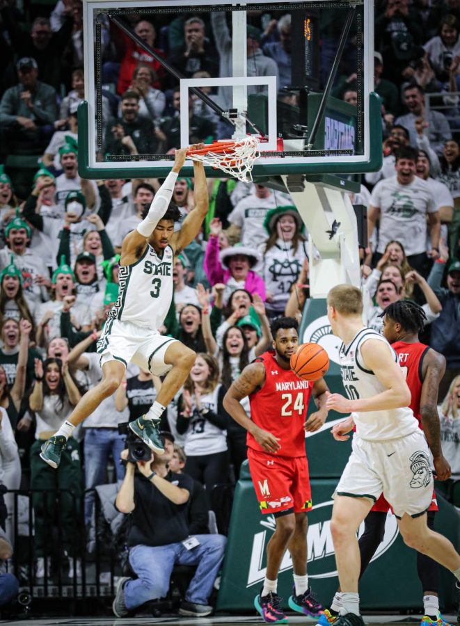Jaden Akins makes the crowd at the Breslin Center go crazy with a slam dunk in the final seconds of Michigan States 63-58 victory over Maryland on February 7, 2023. Photo Credit: Sarah Smith/WDBM