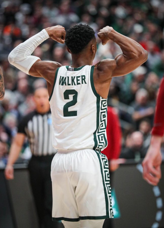 Tyson Walker flexes after a made basket during Michigan States 72-62 victory over USC in the first round of the NCAA Tournament on March 17, 2023. Photo Credit: Sarah Smith/WDBM
