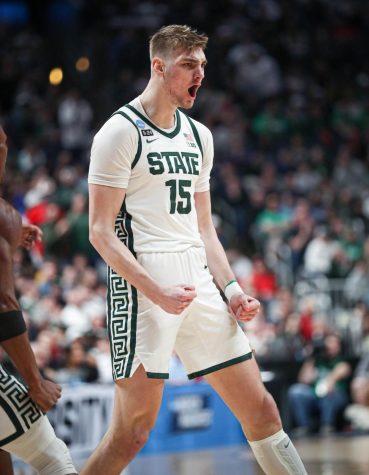 Carson Cooper celebrates after a dunk during Michigan States 72-62 victory over USC in the first round of the NCAA Tournament on March 17, 2023. Photo Credit: Sarah Smith/WDBM