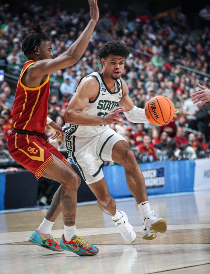 Malik Hall dribbles into the lane during Michigan States 72-62 victory over USC in the first round of the NCAA Tournament on March 17, 2023. Photo Credit: Sarah Smith/WDBM