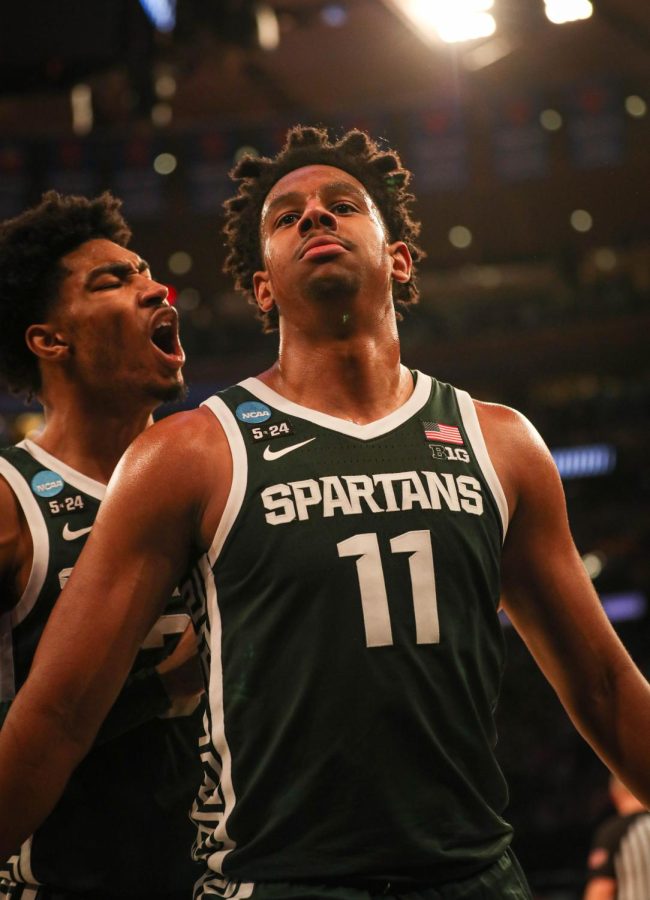 AJ Hoggard and Jaden Akins celebrate after a big basket by Hoggard during Michigan States overtime loss to Kansas State in the Sweet Sixteen on March 23, 2023. Photo Credit: Sarah Smith/WDBM