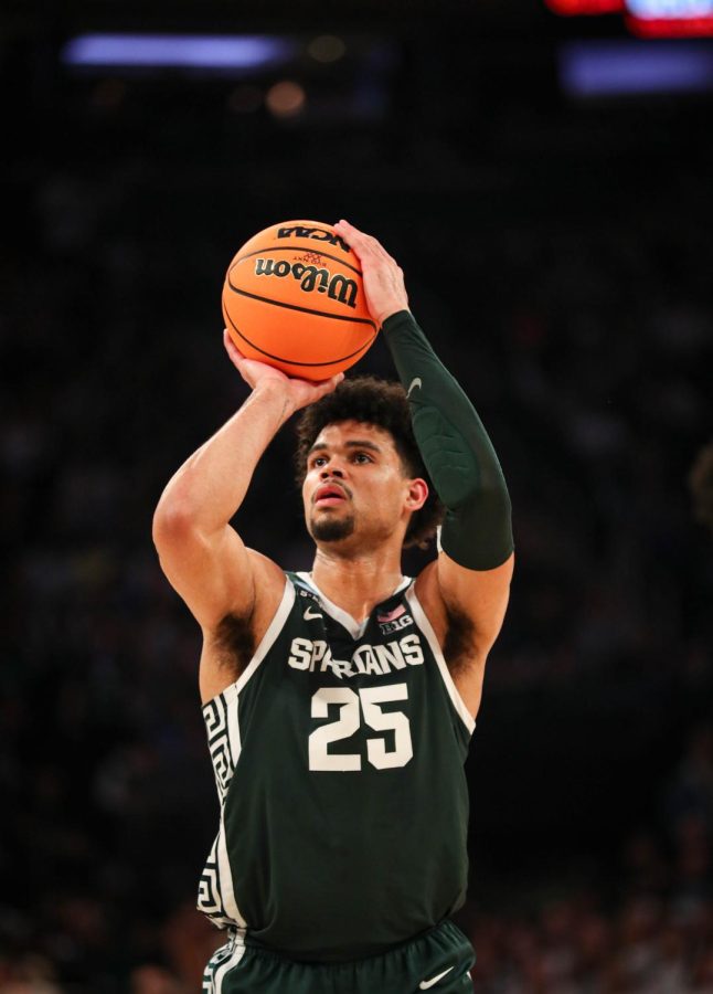 Malik Hall shoots the ball during Michigan States overtime loss to Kansas State in the Sweet Sixteen on March 23, 2023. Photo Credit: Sarah Smith/WDBM