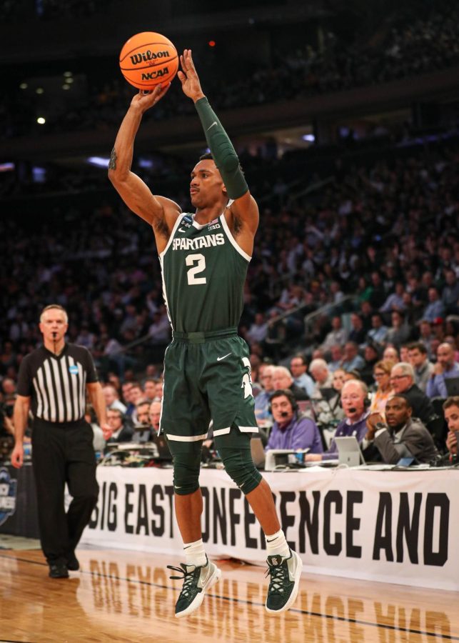 Tyson Walker shoots the ball during Michigan States overtime loss to Kansas State in the Sweet Sixteen on March 23, 2023. Photo Credit: Sarah Smith/WDBM