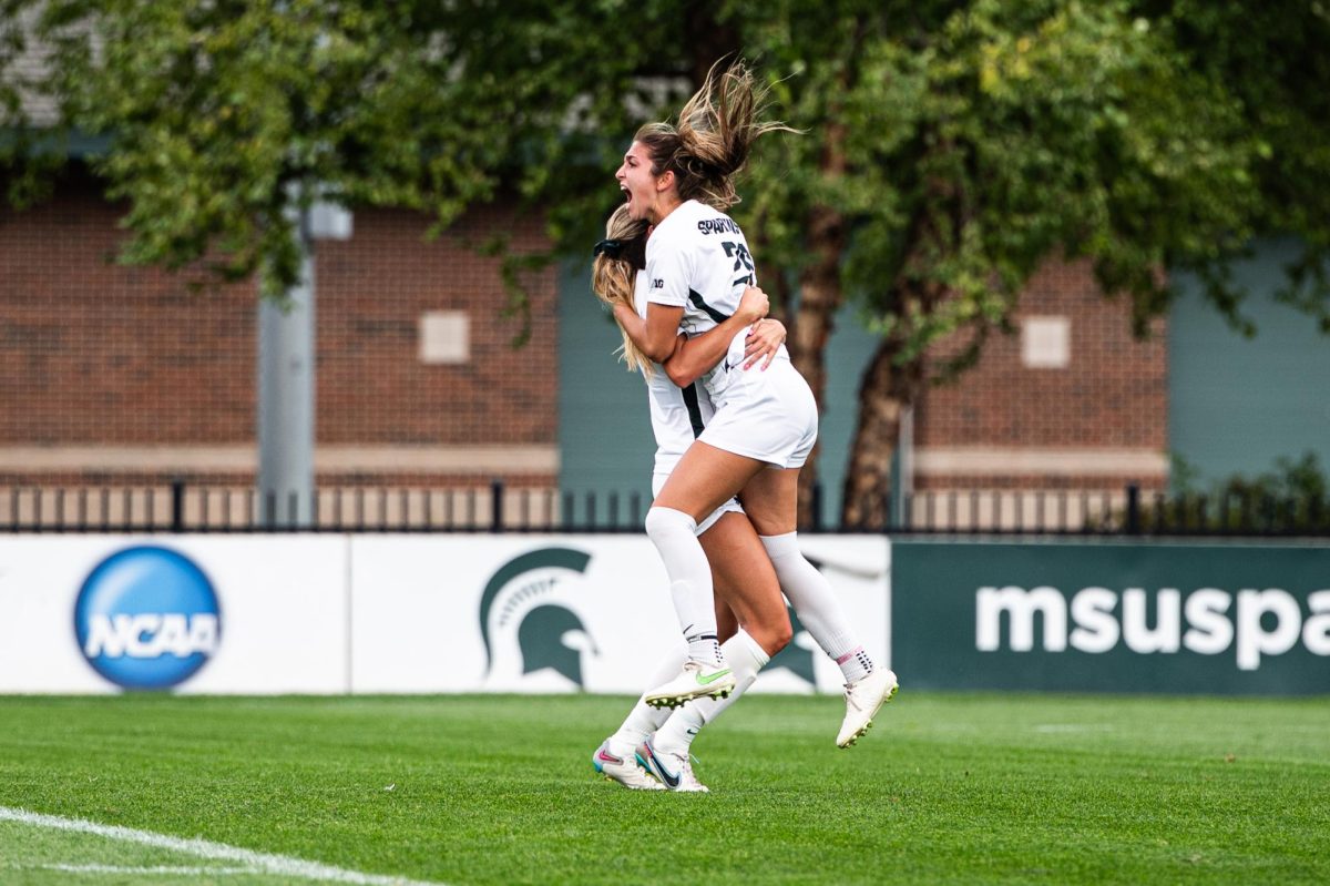 Midfielders Emerson Sargeant and Zivana Labovic embrace while celebrating a Spartan goal against Ohio State at DeMartin Stadium on Sunday, September 17, 2023.