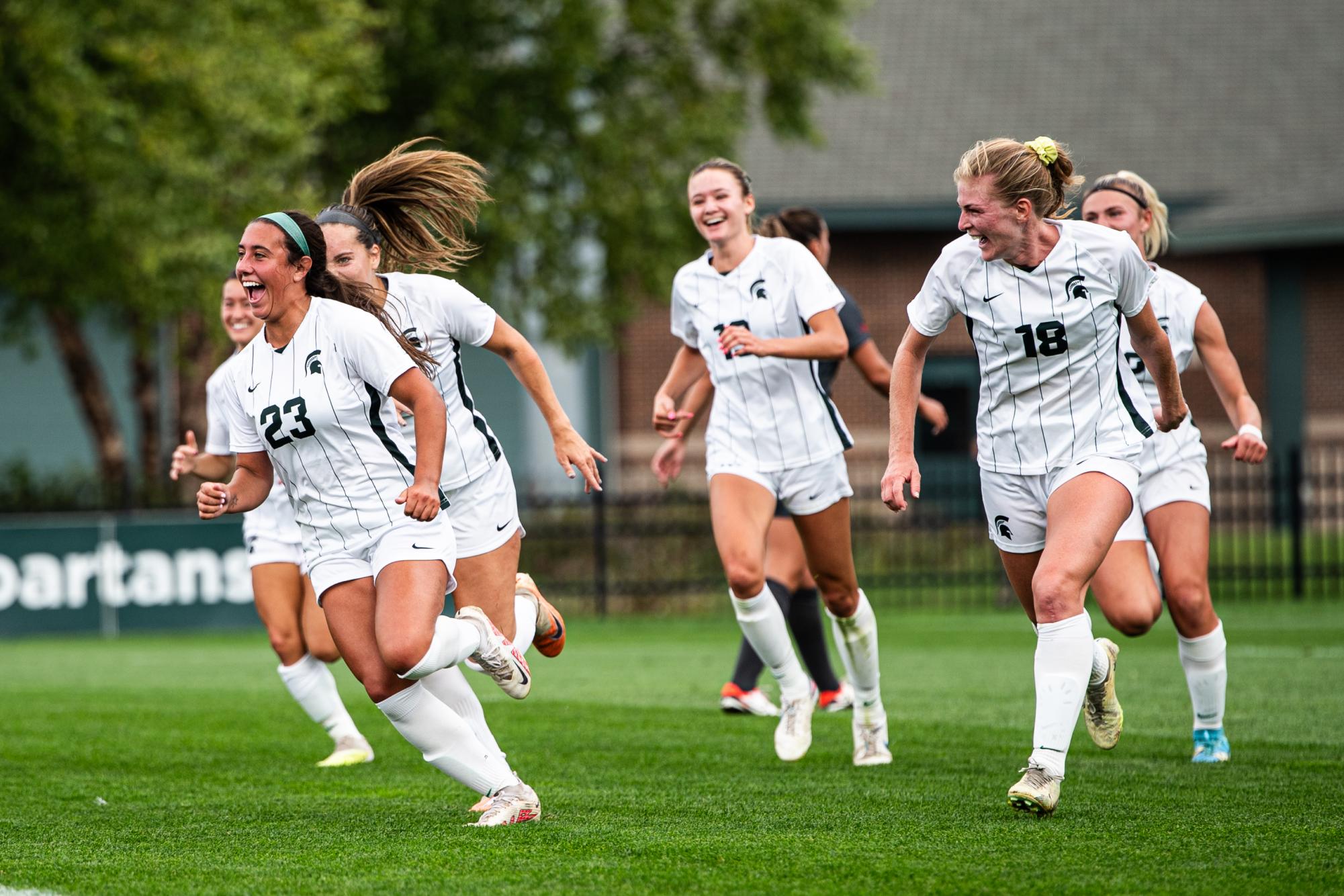 Bella Najera celebrates with her teammates after scoring a goal in the first half against Ohio State at DeMartin Stadium on Sunday, September 17, 2023.