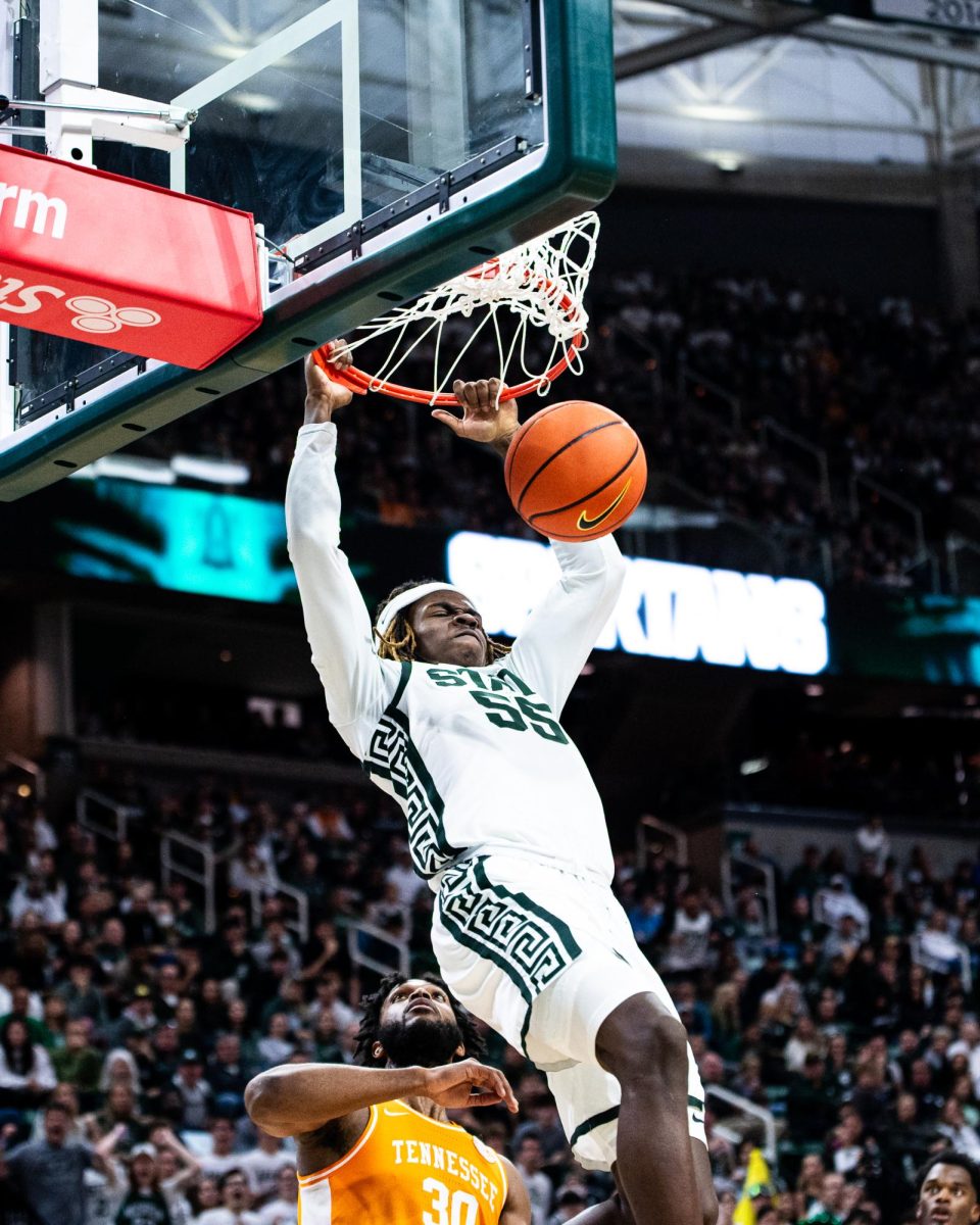 MSU freshman forward Coen Carr throws down a dunk against Tennessee on Sunday, October 29, 2023 at the Breslin Center.

(Photo by Jack Moreland/WDBM Sports/Michigan State University)