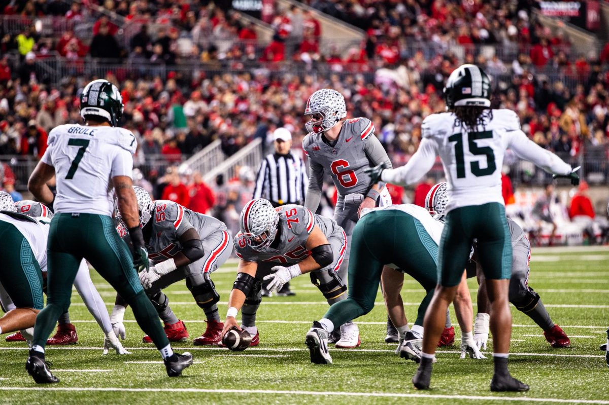 Ohio State junior quarterback Kyle McCord (6) stands under center during a scoring drive against MSU on Saturday, November 11, 2023 at Ohio Stadium.