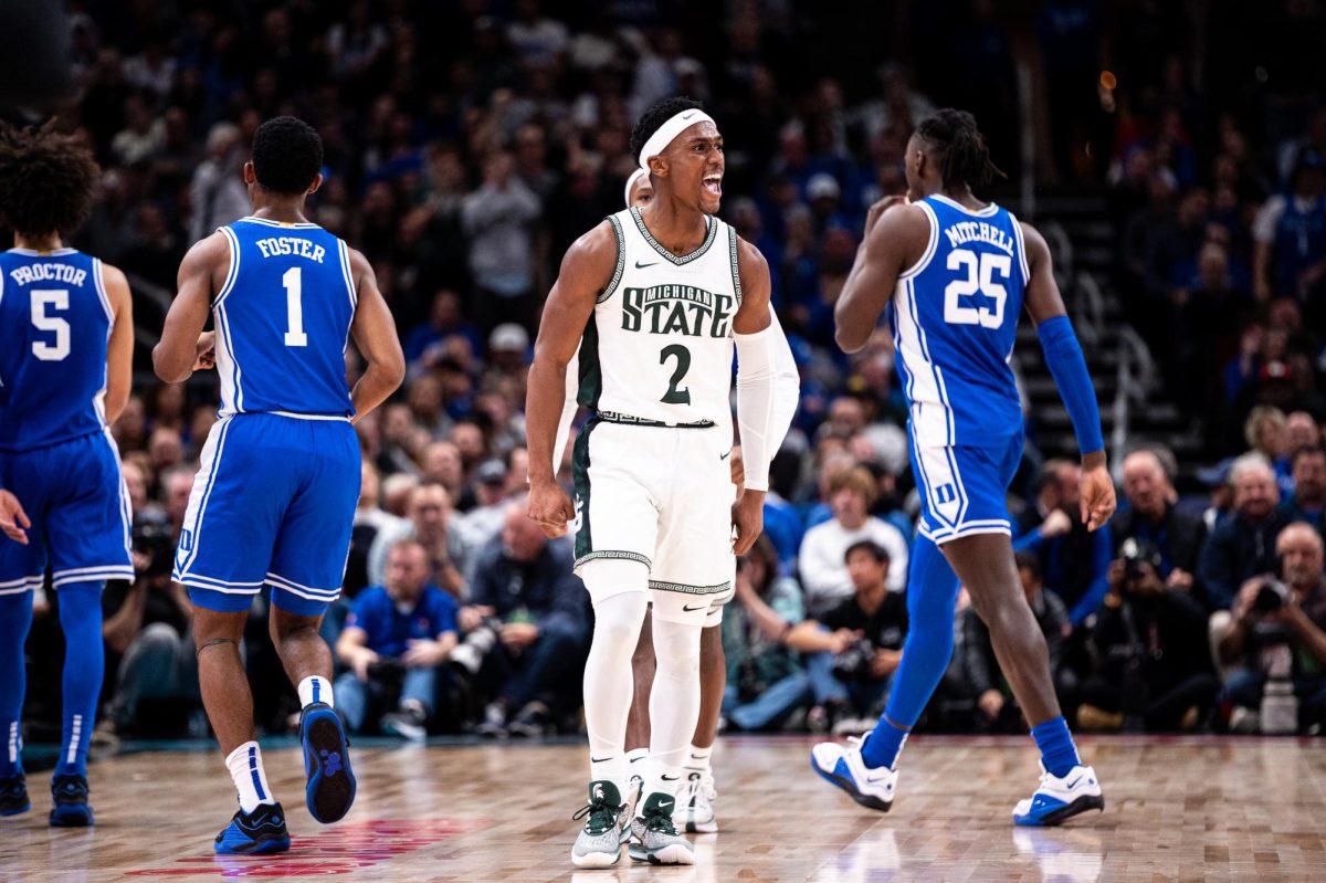 MSU graduate guard Tyson Walker celebrates after hitting a three-pointer against Duke on Tuesday, November 14, 2023 at the United Center in Chicago.