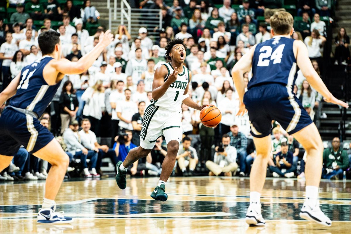 MSU freshman guard Jeremy Fears sets the offense against Hillsdale on Wednesday, October 25, 2023 at the Breslin Center.