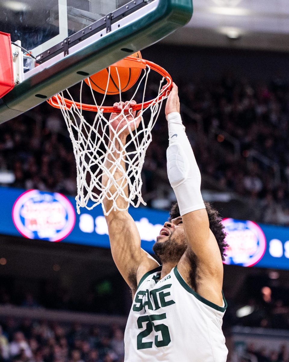 MSU graduate forward Malik Hall finishes at the rim against Indiana State on Saturday, December 30, 2023 at the Breslin Center.