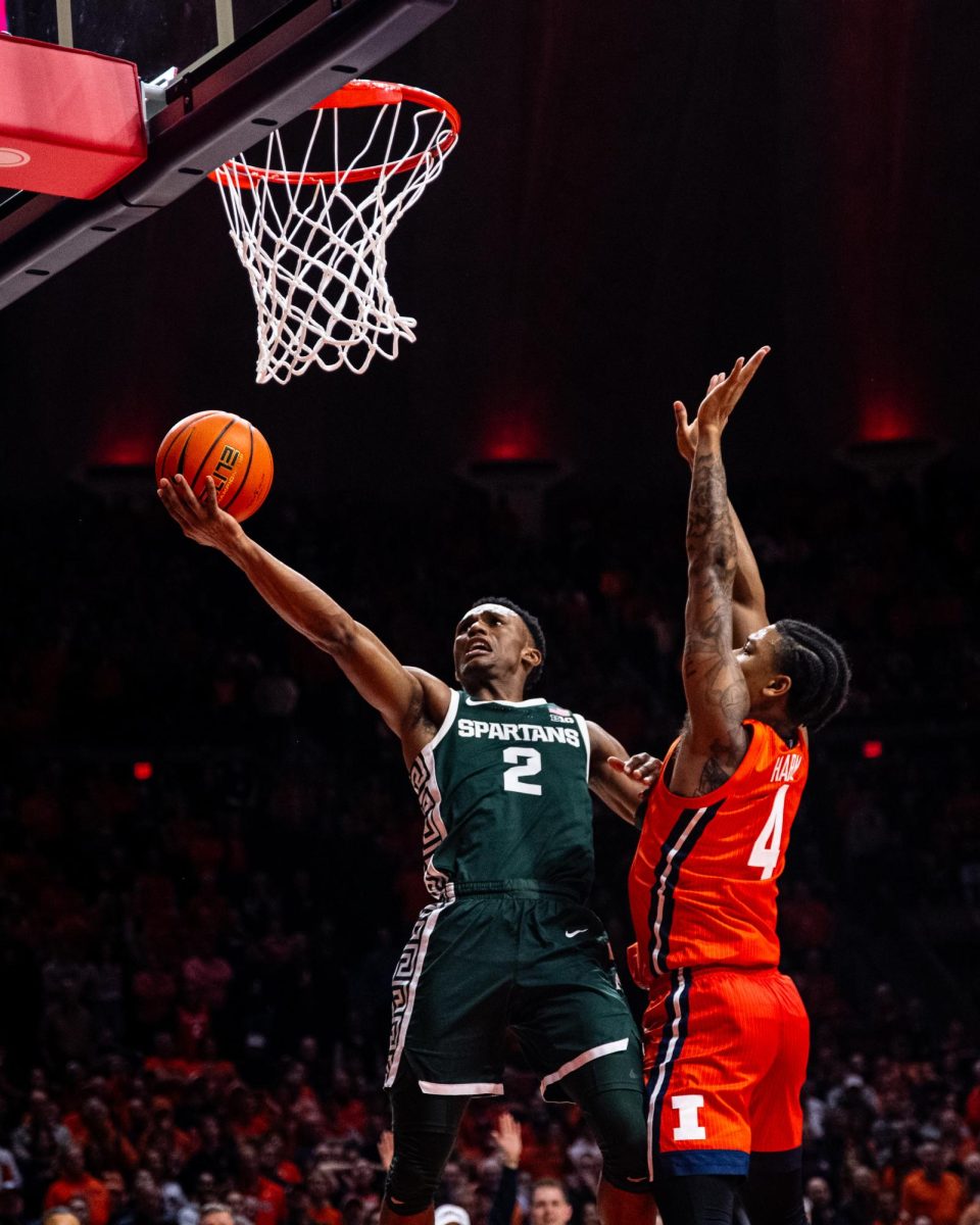MSU graduate guard Tyson Walker finishes a layup to cut into a late Illinois lead on Thursday, Jan. 11, 2024 at the State Farm Center
