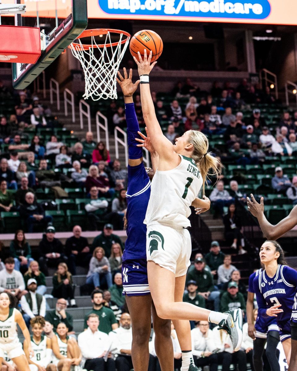 MSU graduate forward Tory Ozment lays the ball up against Northwestern on Wednesday, Jan. 17, 2024 at the Breslin Center. 