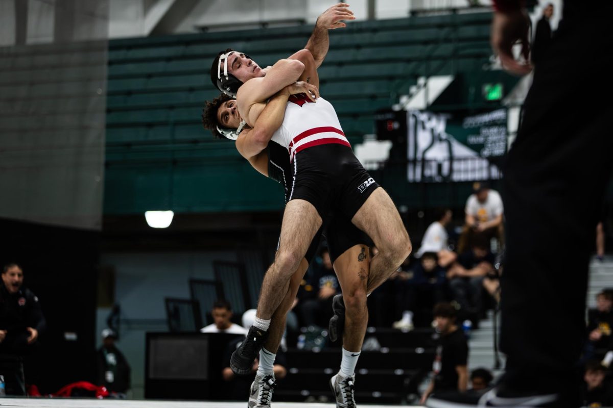 MSU senior Chase Saldate lifts his opponent against Wisconsin on Friday, Jan. 26, 2024 at Jenison Field House.