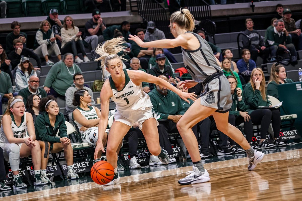 MSU graudate guard Tory Ozment drives against Purdue on Wednesday, Jan. 24, 2023 at the Breslin Center.