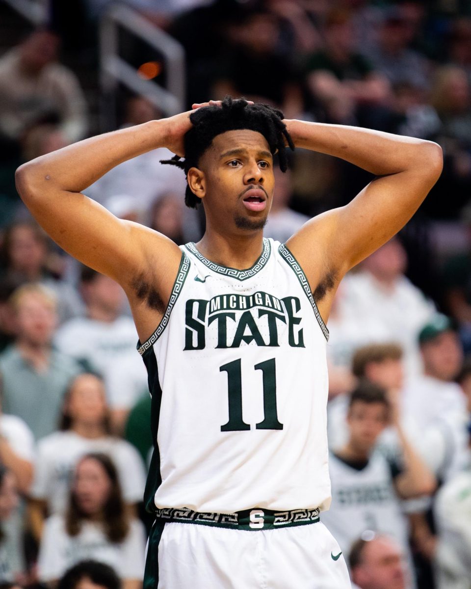 MSU senior guard A.J. Hoggard reacts to a foul call late in the second half against Ohio State on Sunday, Feb. 25, 2024 at the Breslin Center. 