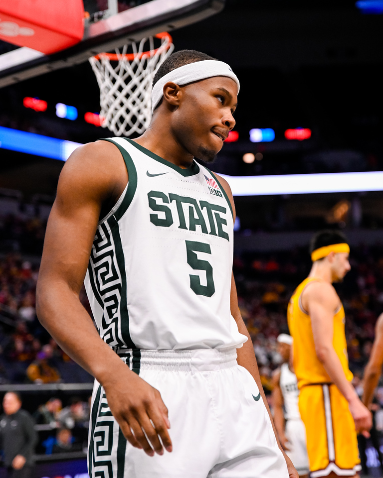 MSU sophomore guard Tre Holloman (5) finished with nine points on 5-5 shooting from the floor to go along with four assists, two steals and a block in MSUs 77-67 victory over Minnesota in the B1G Mens Basketball Tournament on Thursday, Mar. 14, 2024 at the Target Center in Minneapolis, MN.