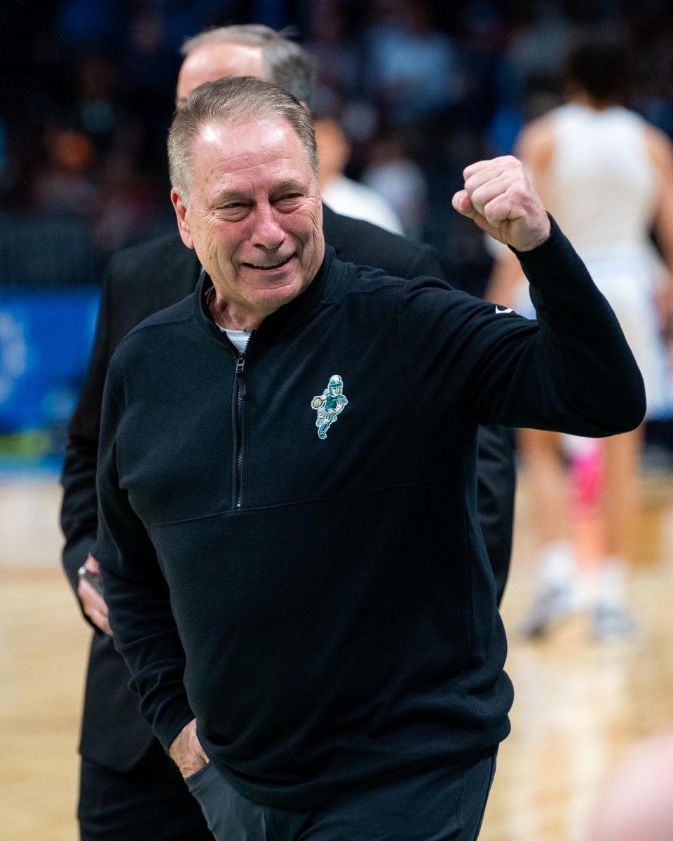 MSU Head Coach Tom Izzo celebrates with Spartan fans in attendance against Mississippi State on Thursday, Mar. 21, 2024 in the first round of the NCAA Tournament at the Spectrum Center in Charlotte, NC.

(Photo by Jack Moreland/WDBM Sports/Michigan State University)
